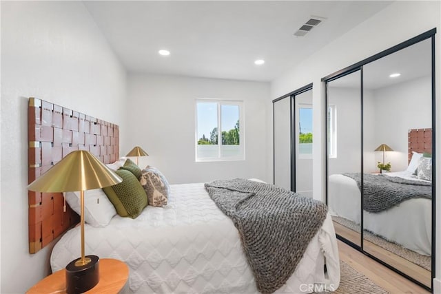 4532 Zella Ln, Yorba Linda, CA 92886 - bedroom featuring two closets, recessed lighting, visible vents, and wood finished floors