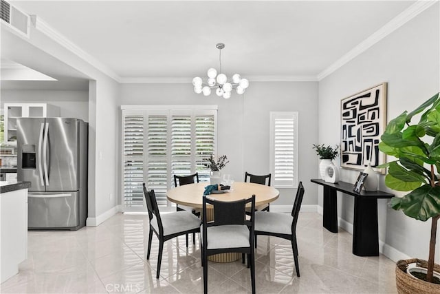 dining area with crown molding, baseboards, a chandelier, and visible vents