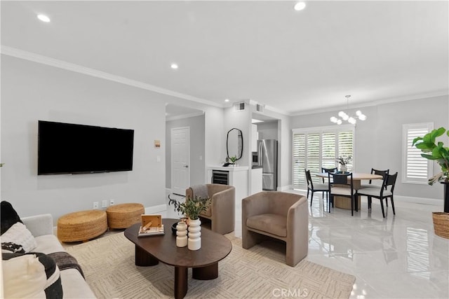living area featuring visible vents, ornamental molding, baseboards, recessed lighting, and a notable chandelier