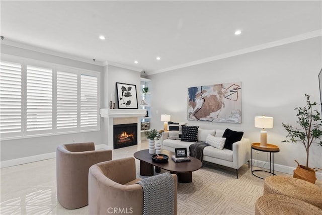 living area featuring recessed lighting, ornamental molding, baseboards, and a warm lit fireplace