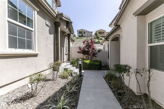27488 Ginger Ct, Saugus, CA 91350 - view of side of home with stucco siding and fence