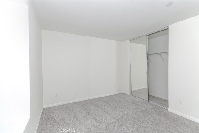 27488 Ginger Ct, Saugus, CA 91350 - unfurnished bedroom featuring carpet floors, a closet, and baseboards