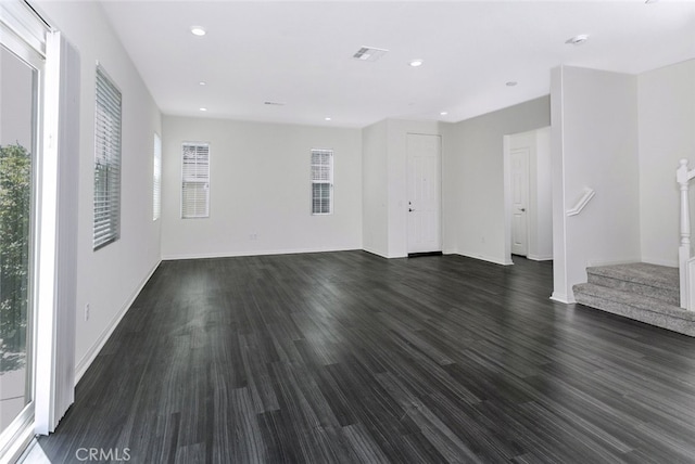 27488 Ginger Ct, Saugus, CA 91350 - unfurnished living room featuring dark wood finished floors, visible vents, and recessed lighting