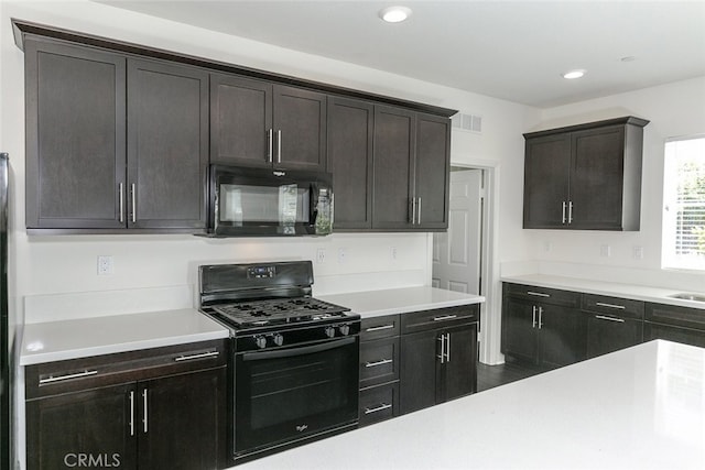 27488 Ginger Ct, Saugus, CA 91350 - kitchen with light countertops, black appliances, visible vents, and recessed lighting