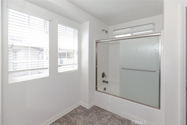 27488 Ginger Ct, Saugus, CA 91350 - bathroom featuring bath / shower combo with glass door and baseboards