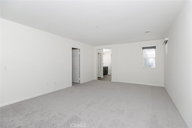 27488 Ginger Ct, Saugus, CA 91350 - unfurnished room with light colored carpet, baseboards, and visible vents