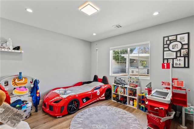 17321 Lahey St, Granada Hills, CA 91344 - bedroom featuring recessed lighting, wood finished floors, and visible vents