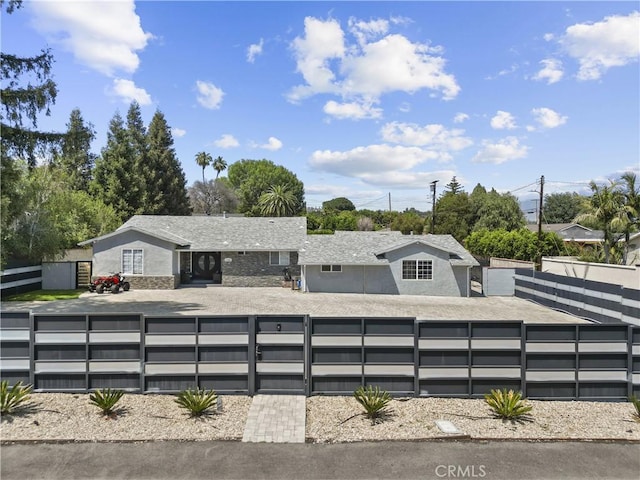 17321 Lahey St, Granada Hills, CA 91344 - view of front of property with a fenced front yard and stucco siding
