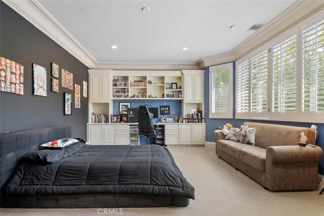 bedroom featuring ornamental molding, recessed lighting, built in desk, and light colored carpet