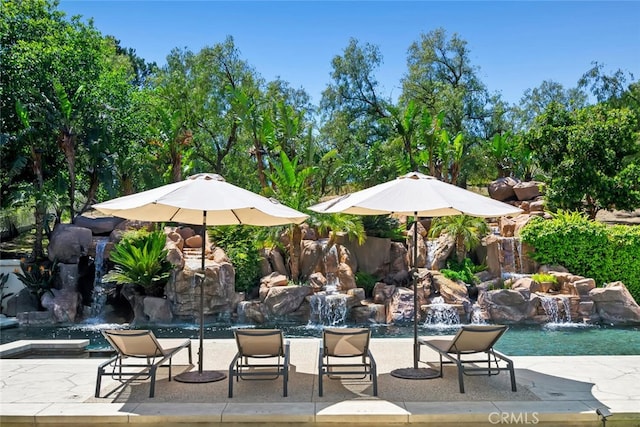 view of pool featuring a fenced in pool and a patio