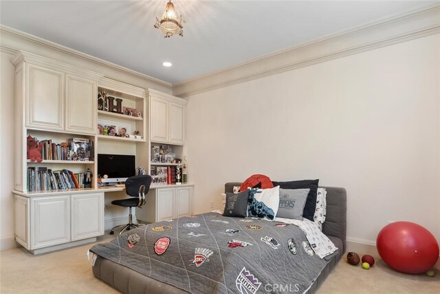 bedroom featuring crown molding, carpet, and built in desk