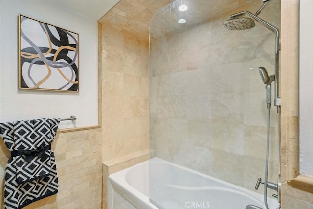 bathroom with tile walls