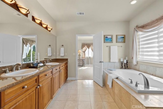 519 S Lucia Ave, Redondo Beach, CA 90277 - full bathroom with a sink, tile patterned flooring, double vanity, visible vents, and a garden tub