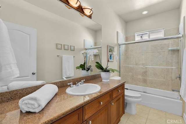 519 S Lucia Ave, Redondo Beach, CA 90277 - bathroom with shower / bath combination with glass door, toilet, tile patterned flooring, and vanity
