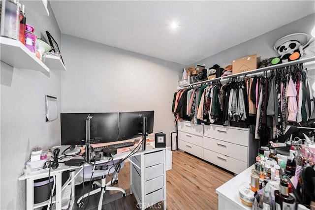 spacious closet with light wood-style floors