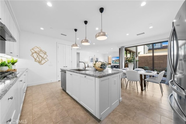 kitchen with visible vents, a sink, appliances with stainless steel finishes, and recessed lighting