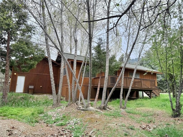 14721 Voltaire Dr, Pine Mountain Club, CA 93225 - rear view of property featuring a deck and stairway
