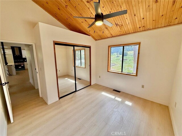 14721 Voltaire Dr, Pine Mountain Club, CA 93225 - unfurnished bedroom featuring light wood finished floors, baseboards, wooden ceiling, vaulted ceiling, and visible vents