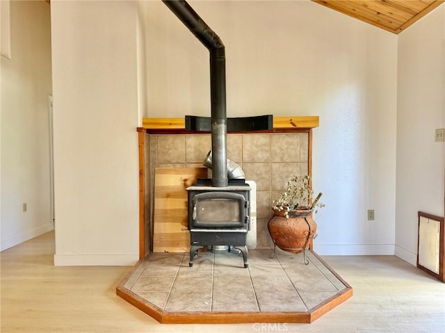 14721 Voltaire Dr, Pine Mountain Club, CA 93225 - interior details featuring baseboards, wood finished floors, and a wood stove