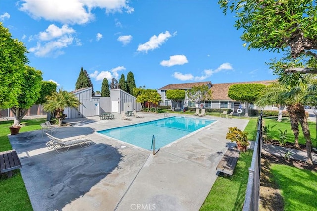 6702 Sun Dr Unit C, Huntington Beach, CA 92647 - pool with a patio, a lawn, and fence