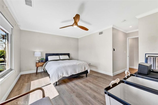 6702 Sun Dr Unit C, Huntington Beach, CA 92647 - bedroom with baseboards, wood finished floors, and visible vents