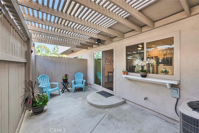 6702 Sun Dr Unit C, Huntington Beach, CA 92647 - view of patio with central AC, fence, and a pergola