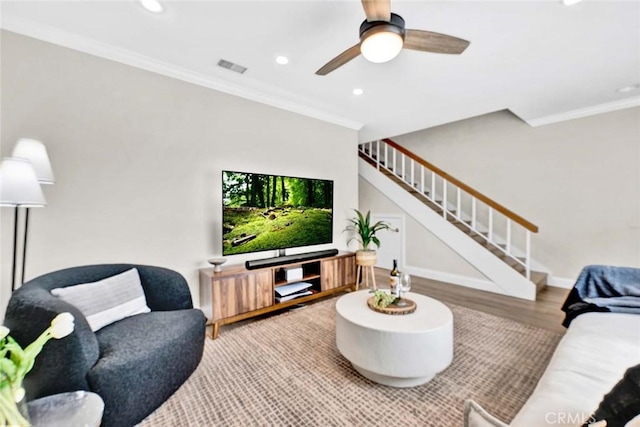6702 Sun Dr Unit C, Huntington Beach, CA 92647 - living room with stairs, recessed lighting, crown molding, and visible vents