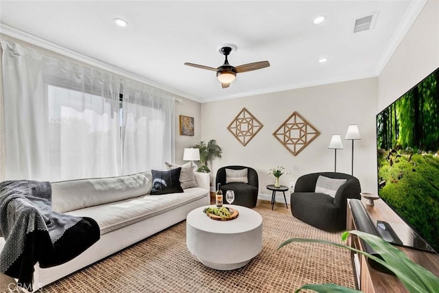 6702 Sun Dr Unit C, Huntington Beach, CA 92647 - living room featuring visible vents, ornamental molding, wood finished floors, baseboards, and ceiling fan