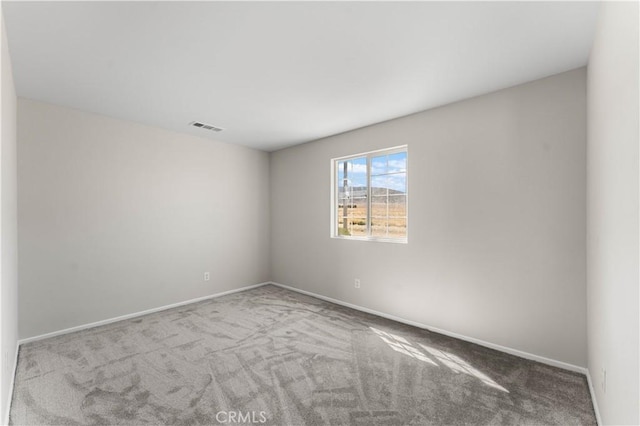 42570 72nd St W, Lancaster, CA 93536 - carpeted spare room featuring visible vents and baseboards