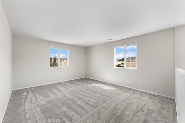 42570 72nd St W, Lancaster, CA 93536 - carpeted empty room featuring baseboards and visible vents