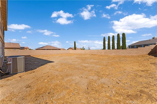 42570 72nd St W, Lancaster, CA 93536 - view of yard featuring a fenced backyard and central AC