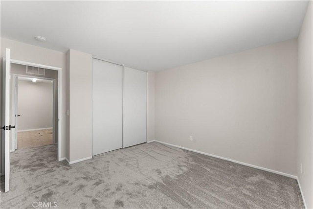 42570 72nd St W, Lancaster, CA 93536 - unfurnished bedroom with baseboards, visible vents, and carpet