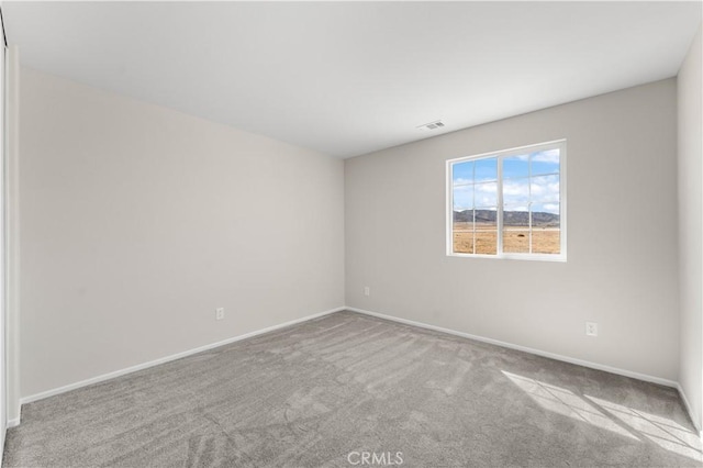 42570 72nd St W, Lancaster, CA 93536 - carpeted empty room featuring visible vents and baseboards