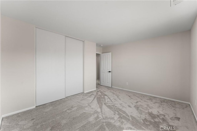 42570 72nd St W, Lancaster, CA 93536 - unfurnished bedroom featuring a closet, carpet, and baseboards