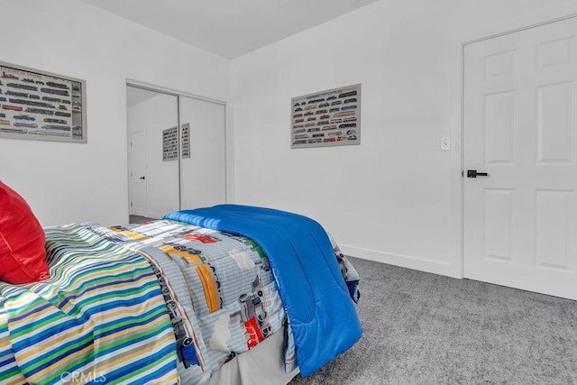 carpeted bedroom featuring a closet