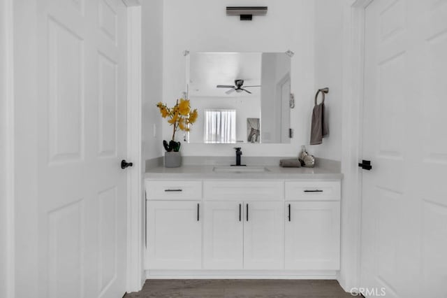 bathroom with vanity and a ceiling fan