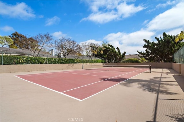 view of sport court featuring fence and community basketball court