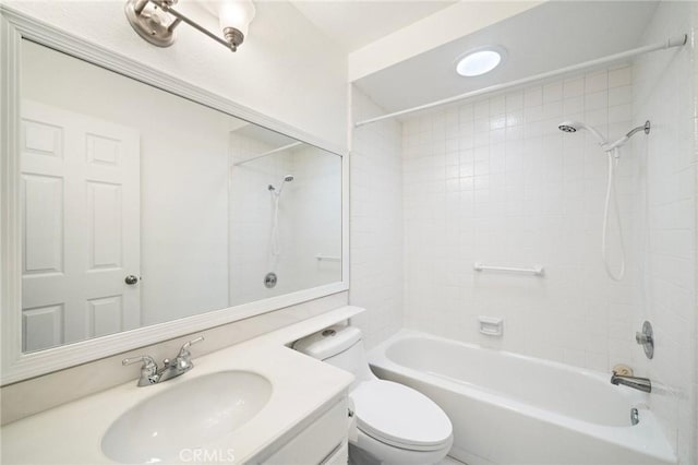 full bathroom featuring vanity, shower / bath combination, and toilet