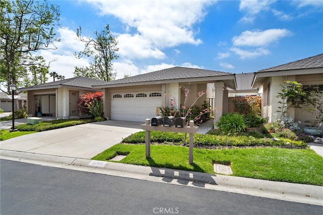single story home featuring an attached garage, stucco siding, and driveway