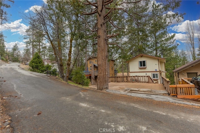 2368 Pine Dr, Running Springs, CA 92382 - view of front of home featuring a wooden deck