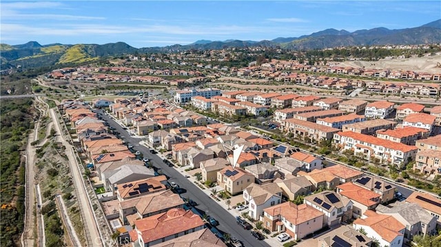 1253 Viejo Hills Dr, Lake Forest, CA 92610 - aerial view of property's location featuring mountains and nearby suburban area