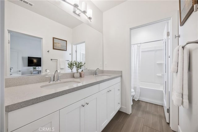 1253 Viejo Hills Dr, Lake Forest, CA 92610 - full bathroom with toilet, double vanity, and shower / bath combo