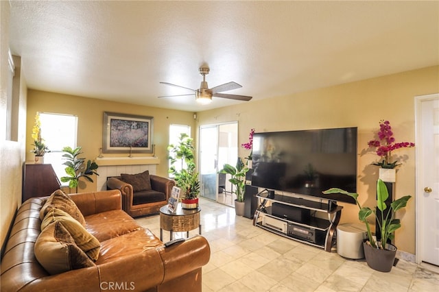3667 Sonoma Oaks Ave, Perris, CA 92571 - living area featuring ceiling fan and marble finish floor