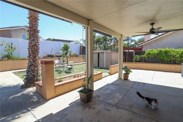 3667 Sonoma Oaks Ave, Perris, CA 92571 - view of patio with a fenced backyard, an outdoor structure, ceiling fan, and a shed