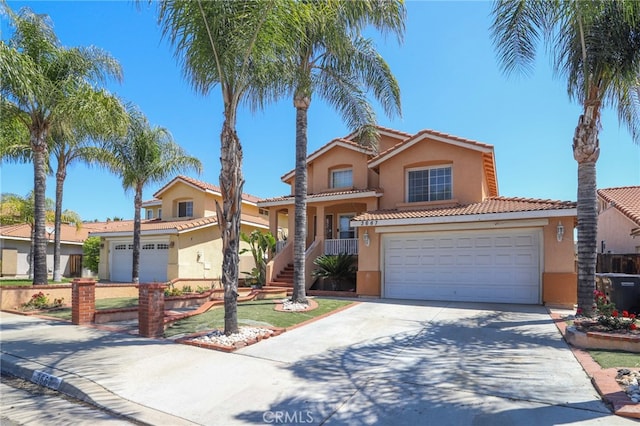3667 Sonoma Oaks Ave, Perris, CA 92571 - view of front of property featuring a tiled roof, driveway, and stucco siding