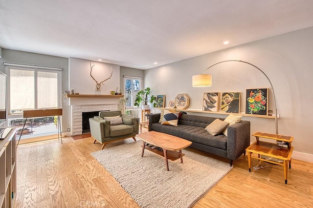 30735 Calle Resplendor, San Juan Capistrano, CA 92675 - living area with recessed lighting, light wood finished floors, a healthy amount of sunlight, and a fireplace