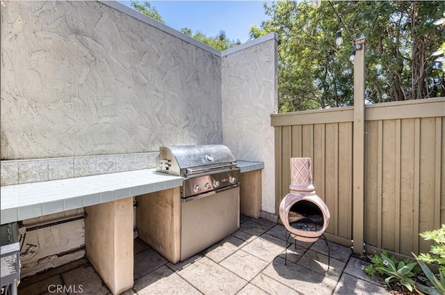 30735 Calle Resplendor, San Juan Capistrano, CA 92675 - view of patio / terrace featuring fence and grilling area