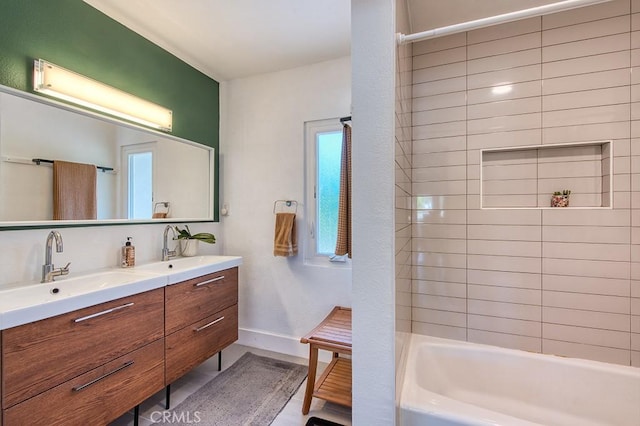 30735 Calle Resplendor, San Juan Capistrano, CA 92675 - bathroom featuring a sink, baseboards, bathing tub / shower combination, and double vanity