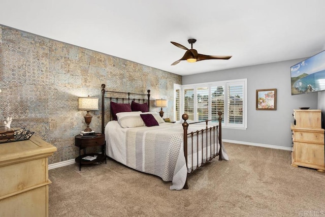 bedroom featuring baseboards, carpet, and ceiling fan