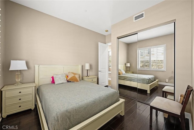 18345 Watson Way, Yorba Linda, CA 92886 - bedroom featuring a closet, baseboards, dark wood-type flooring, and visible vents